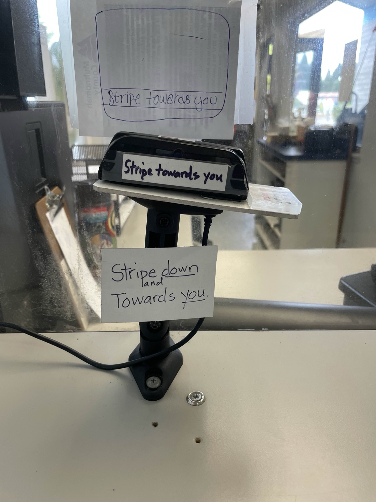 Card reader with multiple Stripe towards you signs