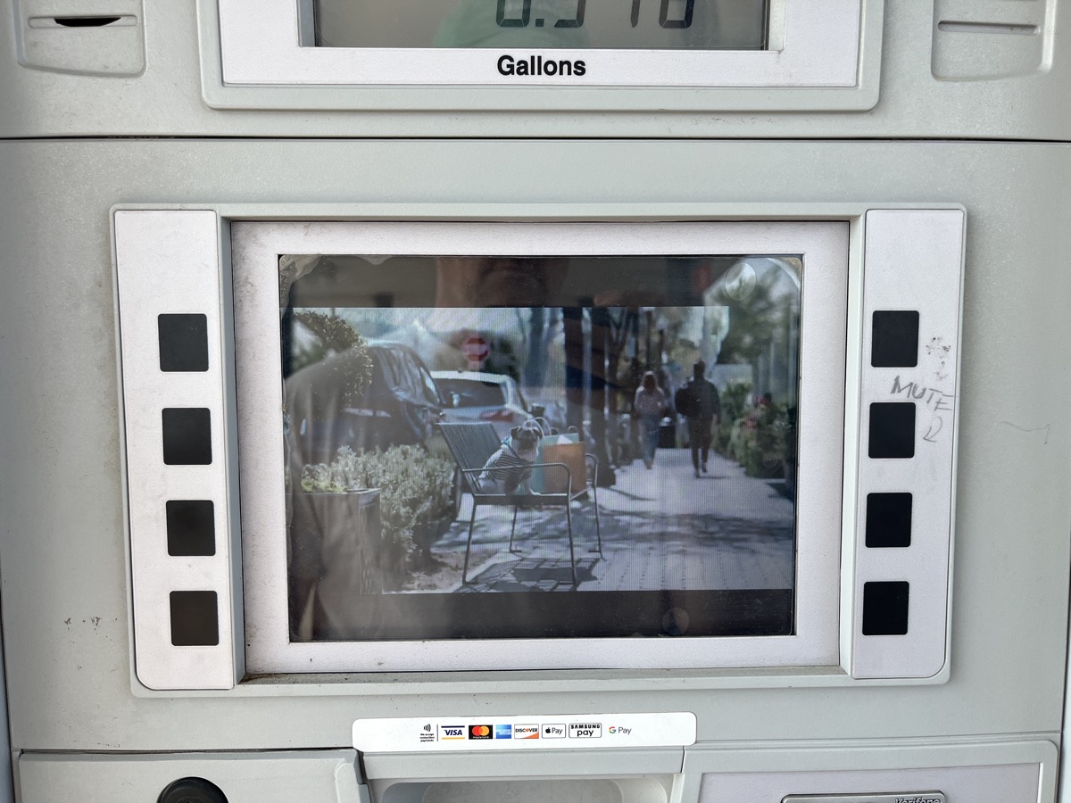 Gas pump screen with mute button annotation