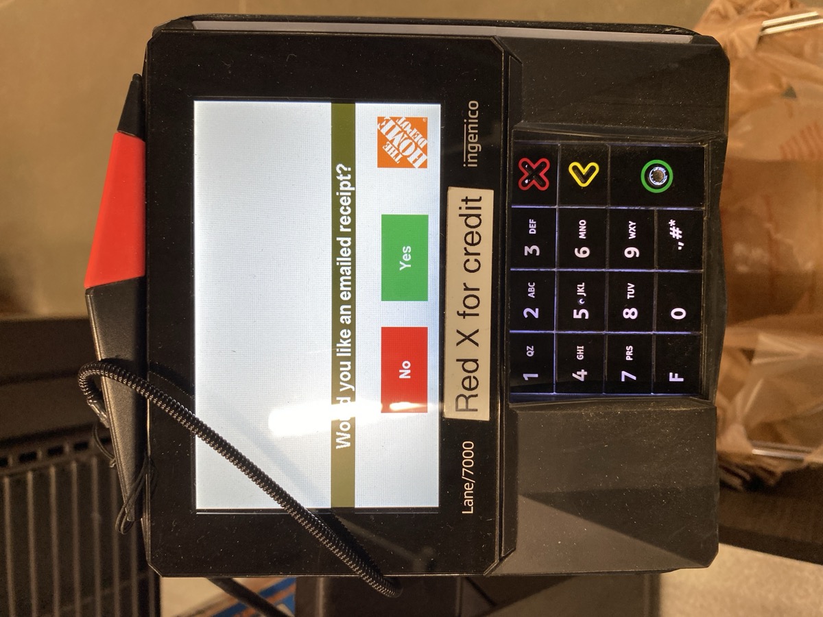 Payment terminal with red X credit sign