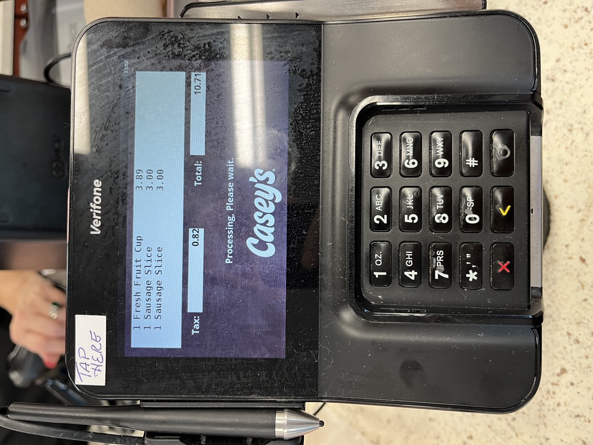 Verifone payment terminal with tap here sign